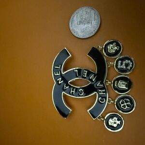 New upcycled CHANEL Black and Gold brooch